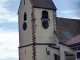 le clocher de l'église luthérienne et son nid de cigognes