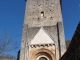 Photo suivante de Besse La façade occidentale et le portail de l'église Saint-Martin.