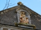 Photo suivante de Bourrou Détail : Niche avec la Vierge sur la façade ouest de l'église.