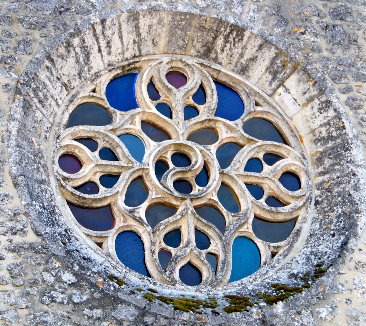 La rose de la façade ouest. - Champagnac-de-Belair