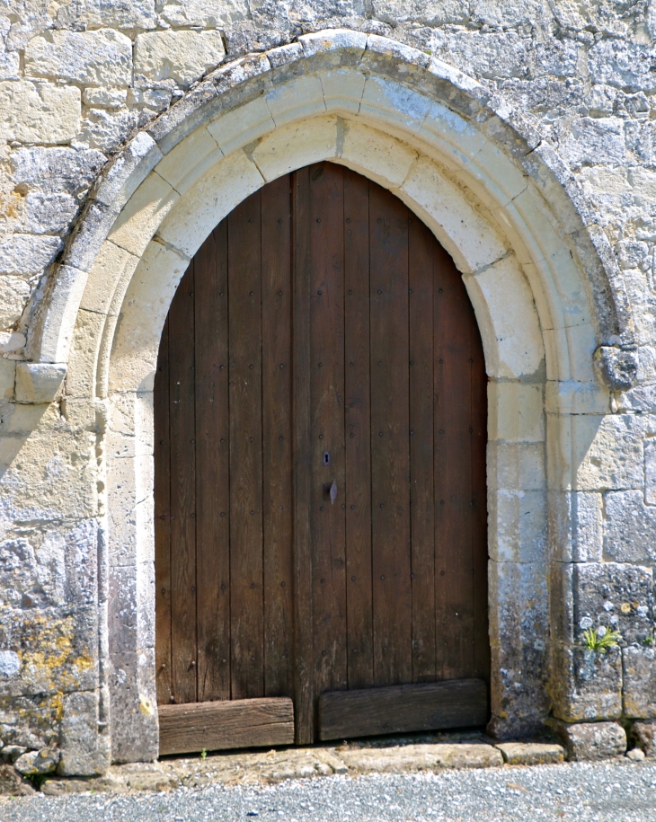 Portail de l'église Saint Jean Baptiste de Fontaine. - Champagne-et-Fontaine