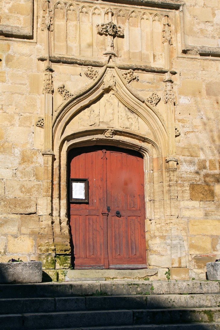 Portail de la façade sud de l'église Saint Thomas. - Excideuil