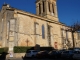 Photo suivante de Excideuil Façade latéral sud de l'église Saint Thomas, romane modifiée au XVe siècle.