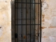 Photo suivante de Grignols Porte de la façade latérale sud, église Saint Front de Bruc.