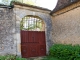 Photo suivante de Limeuil Portail et génoise d'une maison du village.