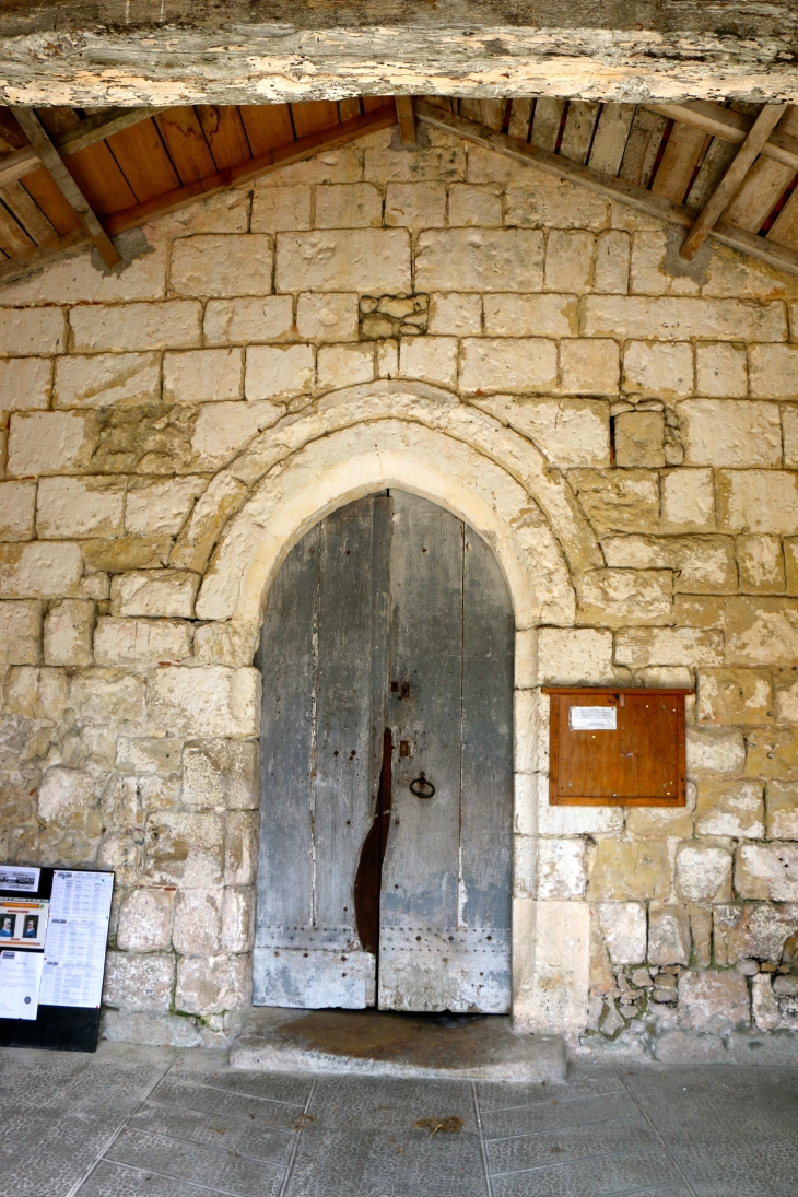 Le portail de l'église Saint Eutrope. - Lusignac