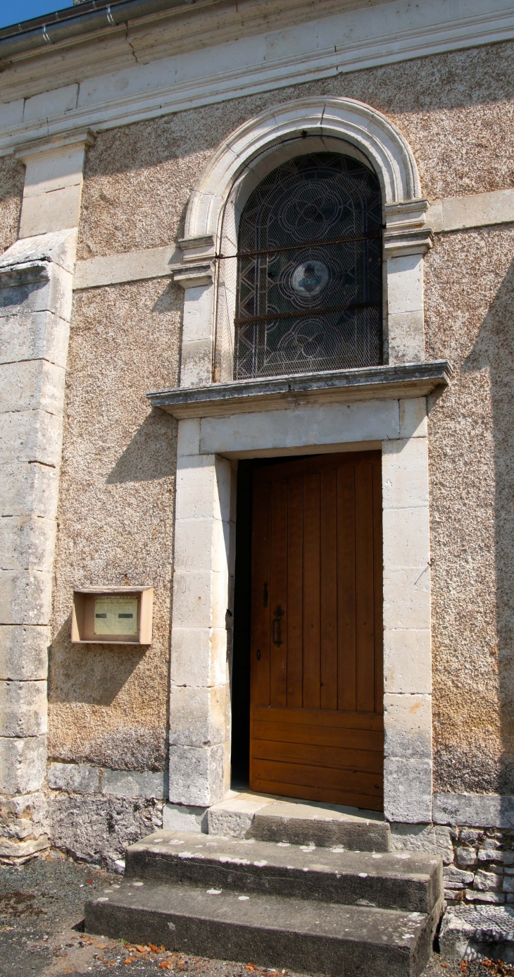 Porte de la façade latérale sud. - Saint-Pantaly-d'Ans