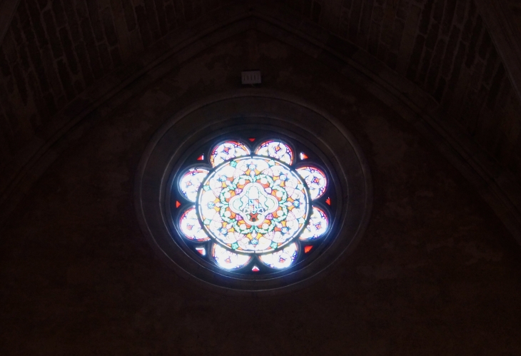 Rose-de-l-eglise-notre-dame sur la partie latérale. - Créon