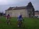 Photo suivante de Saint-Palais Eglise romane 12ème (IMH) lors d'une compétition de cyclo-cross.