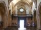 Photo suivante de Sauveterre-de-Guyenne L'intérieur de l'église Notre-Dame, vers le portail, et son curieux balcon.