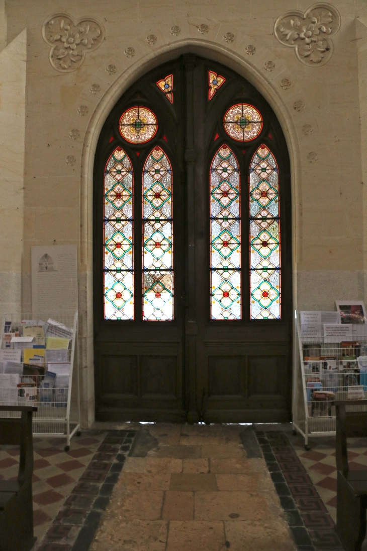 La porte de l'église Notre Dame. - Villeréal