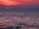 Coucher de soleil et feux de la Saint Jean sur la plge de Cabourg 