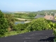 Photo suivante de Omonville-la-Petite les toits et la mer au loin