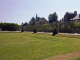 Photo suivante de L'Aigle le parc public  : vue sur le clocher de l'église Saint Jean