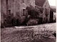 Photo suivante de Bouilland Inondations Hiver 1965 Photo 1 Le Monsieur avec la casquette : Mr Toulot ancien Maire de Bouilland A coté de lui le Monsieur qui regarde les escaliers : Monsieur Monin le Propriétaire de l'Auberge Sur les marches bras croisés, la fille du Propriétair