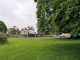 Photo précédente de Champallement le château vu de la place en herbe