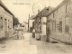 Carte postale de la rue principale du 15/11/1915, près ancienne boulangerie et église.