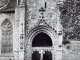 Le portail de l'église Saint Michel, vers 1920 (carte postale ancienne).