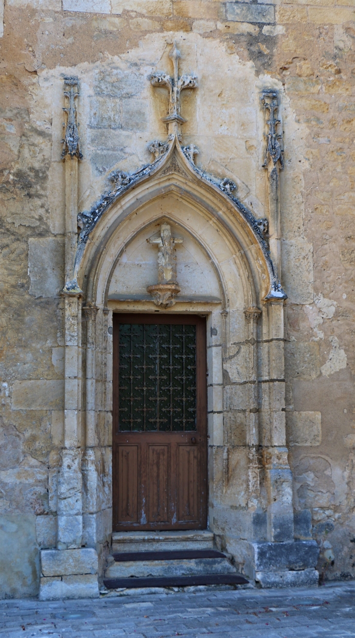 Eglise Notre Dame : petite porte de la façade Sud. - Le Pont-Chrétien-Chabenet