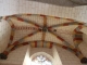 Clé-de-voûte restaurée avec deux anges portant un écusson dans la chapelle du Sacré-Coeur (transept gauche).