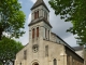 L'église à été construite après 1852, en remplacement de celle du château.  Un tableau de Bernard Lorjou (Mon village, L'église Rose) représente l'église de Saint-Denis-sur-Loire