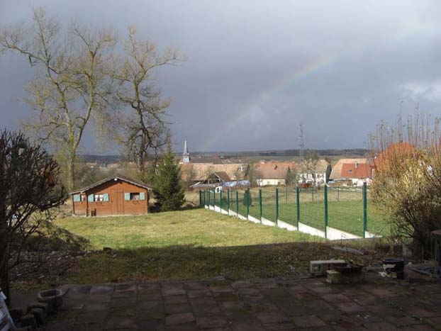 Eglise de Froidefontaine avec arc en ciel