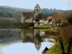 Photo suivante de Beaulieu-sur-Dordogne La Chapelle des Pénitents se reflétant dans la Dordogne.