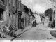 Vers 1940 - Rue centrale (carte postale ancienne).