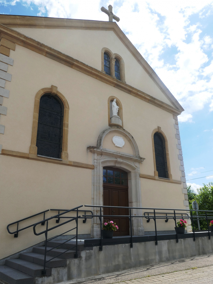 L'entrée de l'église - Secourt