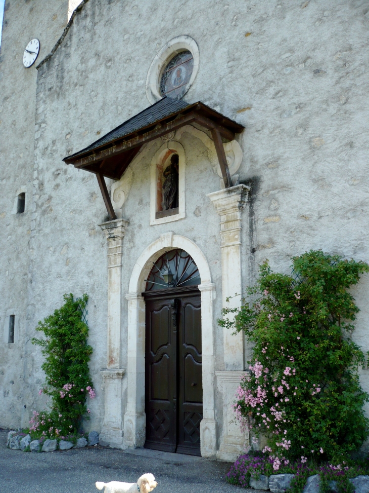 Portail de l'église Saint-Barthélémy. - Caumont