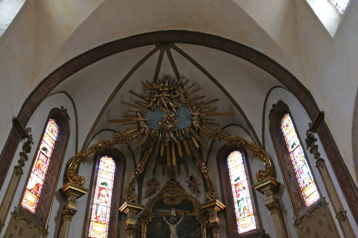 Détail du retable de l'église Saint Geniez. - Saint-Geniez-d'Olt