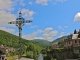 Photo suivante de Saint-Geniez-d'Olt Croix de mission sur le vieux pont qui enjambe le Lot.