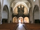 Photo précédente de Saint-Geniez-d'Olt La nef vers le portail de l'église Saint Geniez.