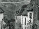 Une rue du village, vers 1910 (carte postale ancienne).