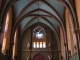 L'intérieur de l'église Saint-Christophe vers le portail.