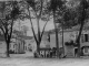 Photo suivante de Montaigu-de-Quercy Entrée de la Grande-Rue, début XXe siècle (carte postale ancienne).