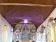 La nef du XVIIe siècle avec au fond  le retable du maître autel daté de 1634. Eglise Saint SAturnin.