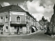 Photo suivante de Évron Rue de la Fontaine et l'église (carte postale de 1968)