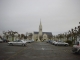 Photo suivante de Aigrefeuille-d'Aunis Vue sur l'église et le monument aux morts depuis la place de la République