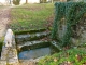 Fontaine et lavoir au pied de l'église Saint Martial.