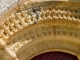 Photo suivante de Melle Détail : archivoltes du portail de l'église Saint Pierre.