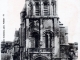 Photo suivante de Poitiers L'église Sainte Radegonde - Le clocher du XIe siècle et son entrée ouest du XVe siècle, vers 1920 (carte postale ancienne).