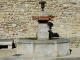 Photo précédente de Le Pègue Fontaine de la place du village