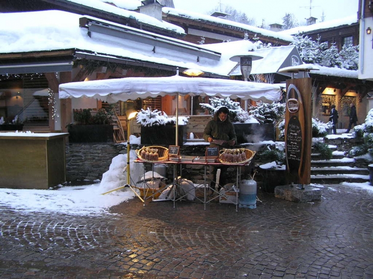 Village megève,calèche et piste de ski