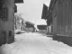 Rue principale de Morillon sous la neige